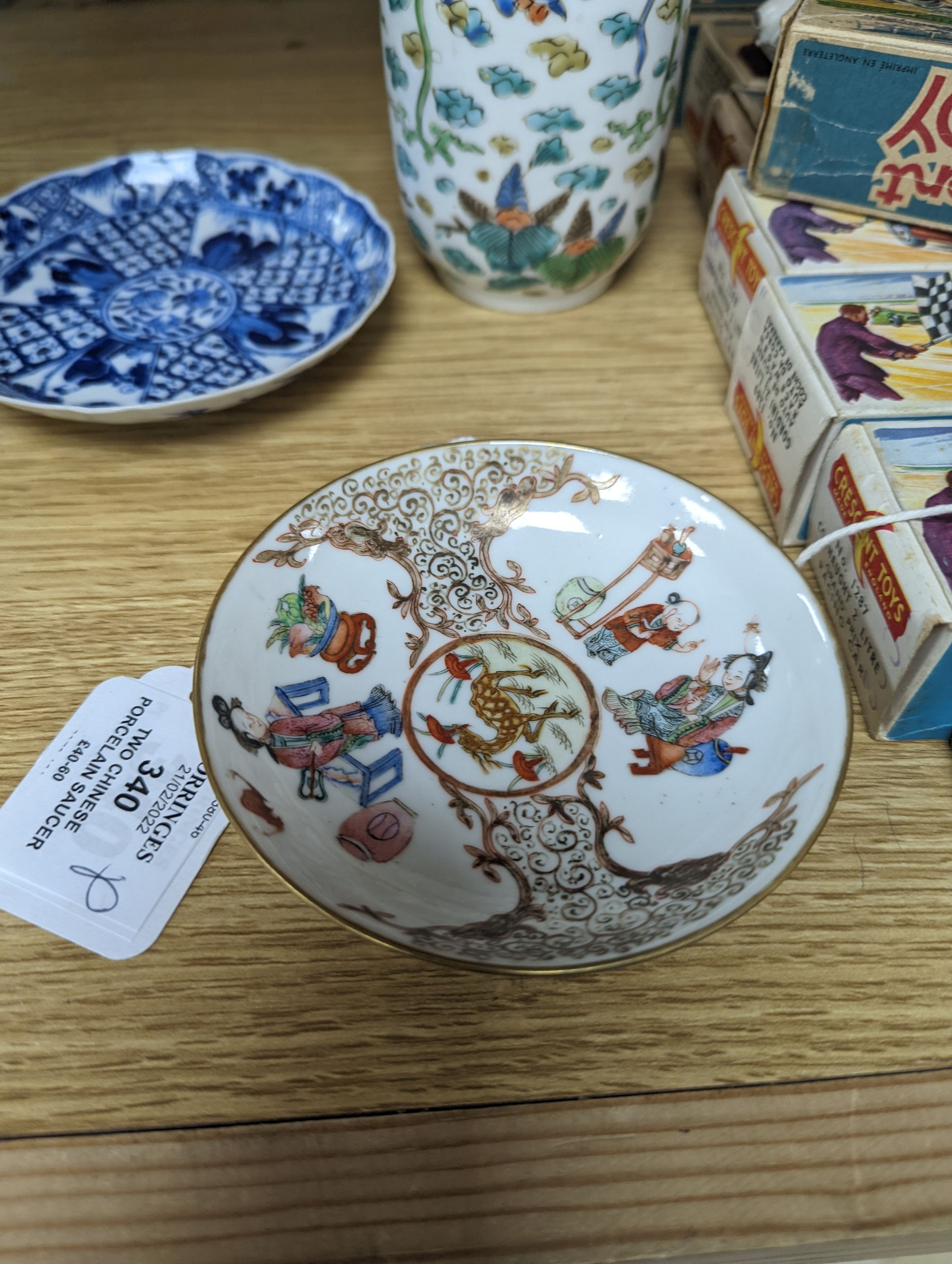 Two Chinese porcelain saucer dishes and an enamelled porcelain vase, 18th century and later, 12.5cm